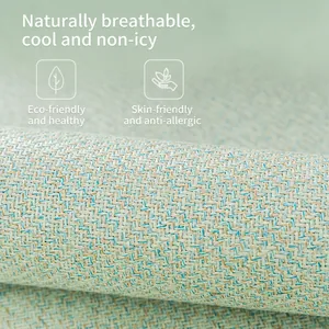 Gros plan d'un coussin de chaise respirant en rotin de soie glacée aux tons bleu et beige
