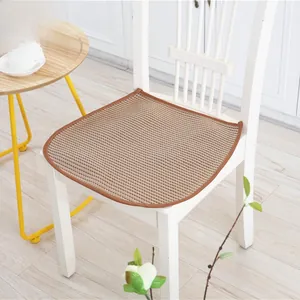 Breathable brown honeycomb mesh chair cushion on a white elegant dining chair