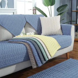 Detail of thickened rabbit plush sofa covers with wheat pattern quilting in multiple colors