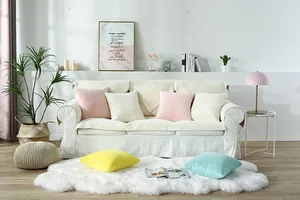 Close-up of thick plush sofa cushion texture in pastel colors for winter home decor
