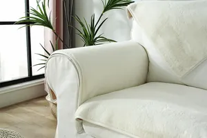 Close-up of thick creamy rabbit fur sofa cover showcasing soft texture and premium binding