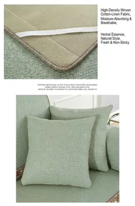 Close-up of green rattan woven sofa mat showing non-slip mesh and elastic strap