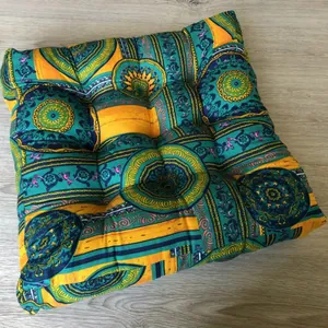 Detail of bohemian mandala pattern square cushion with 9-point tufted quilting design