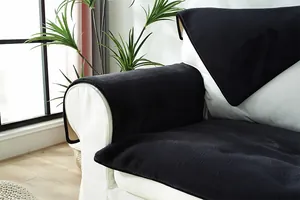 Detail of soft navy blue faux rabbit fur sofa cover with thick plush texture and non-slip back