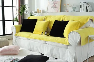 Macro detail of thick yellow faux rabbit fur sofa cover with soft plush texture