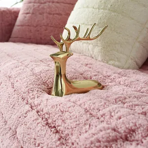 Pink plush bay window mat with square quilted pattern and soft faux fur texture for home decor