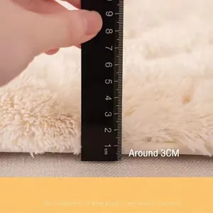Thick cream plush sofa cover with 3cm long faux fur texture measured by a ruler