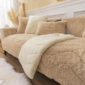 Close-up of thick plush sofa cover with wave embossed texture in cozy cream and beige