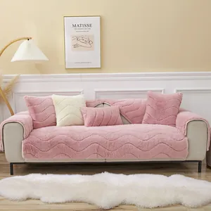 Detailed view of pink plush sofa cushion with wave stitching and soft texture
