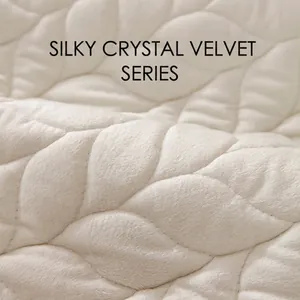 Soft white crystal velvet sofa cushion with leaf-shaped quilting and plush texture