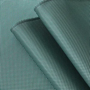Green and white houndstooth ice silk sofa mat with anti-slip texture and fine stitching