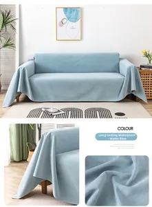 Close-up of waterproof light blue corduroy sofa cover showing liquid-resistant fabric