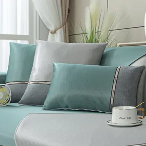 Close-up of breathable ice silk sofa cushion with woven texture and gray-green color blocking