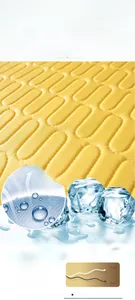 Macro detail of yellow ice silk cooling fabric with U-shaped quilted texture and mesh base