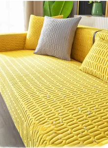 Detail showing the waterproof wave-textured fabric and hydrophobic drops on the sofa cover