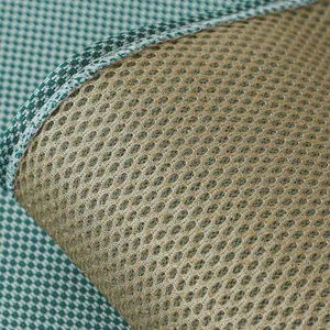 Macro detail of breathable ice silk sofa mat with non-slip silicone backing and honeycomb mesh