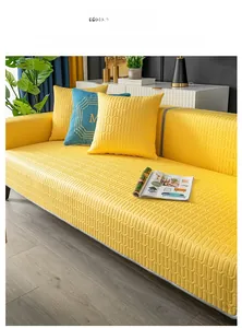 Detailed view of yellow ice silk sofa mat with quilted texture and cooling fabric