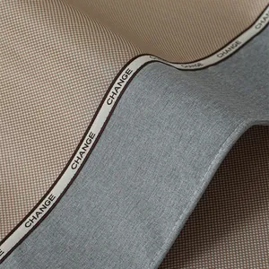 Detail of ice silk sofa mat showing houndstooth fabric texture and decorative brand tape