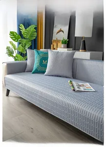 Close-up of grey latex ice silk cooling sofa mat with textured wave pattern and matching pillow