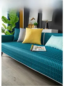 Close-up of quilted latex ice silk sofa mat in dark green with wavy cooling texture