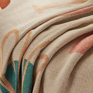 Macro detail of the woven texture and geometric pattern on the American cotton sofa cover