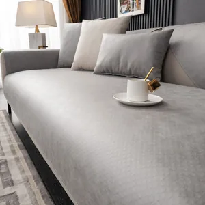 Detailed view of light gray waterproof sofa cover with fine diamond textured fabric pattern