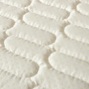 Quilted latex ice silk sofa mat with non-slip texture and minimalist beige embossed pattern