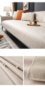 Detail of Losen beige sofa cover featuring waterproof fabric and non-slip backing texture