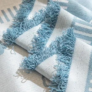 Modern minimalist cotton linen sofa cover with light blue weaving and tassel edge detail