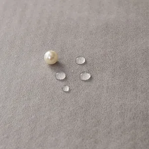 Waterproof grey microfiber sofa cover fabric with water droplets and pearl accent