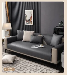 Detail of dark gray waterproof sofa cover set with textured non-slip fabric surface