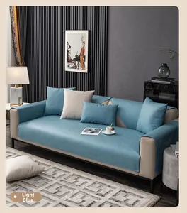 Detailed texture of light blue waterproof anti-scratch sofa cover on fabric sofa