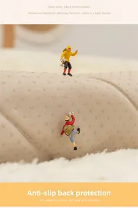 Detailed macro view of anti-slip granules on the soft cotton fabric backing