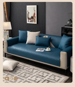 Close-up of waterproof dark blue fabric sofa cover with modern woven texture and anti-slip backing