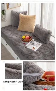 Detail of gray plush bay window mat showing wavy texture and zipper for easy removal