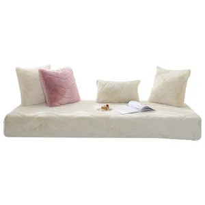 Thick faux rabbit fur bay window mat with wave pattern and plush decorative pillows