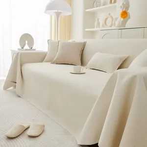 Dicker cremefarbener Teddy-Plüsch Sofaüberzug mit rutschfester Textur und Kissen