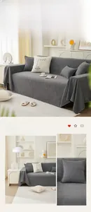 Detail of dark grey sofa cover featuring high-quality rice grain texture and white piping