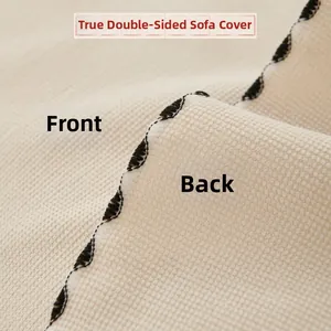 Detailed close-up of reversible woven sofa cover fabric showing beige double-sided texture