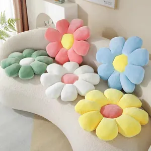 Modern minimalist sunflower plush cushions in five colors on a white curved sofa