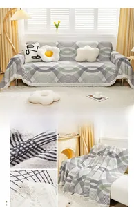Detail of woven fabric texture and tassel fringe on cat-proof geometric sofa cover