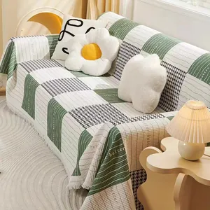 Green and white checkerboard anti-cat scratch sofa cover with tassels and better text