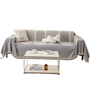 Housse de canapé en chenille avec motifs d'arches et pompons, design bicolore gris