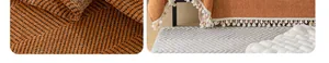 Macro shot of herringbone chenille sofa cover with decorative tassels and soft pom-poms
