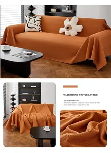 Funda de sofá naranja gofrada impermeable que protege contra manchas y arañazos