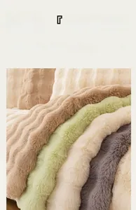 Close-up of machine washable plush sofa cover with wavy texture in various colors