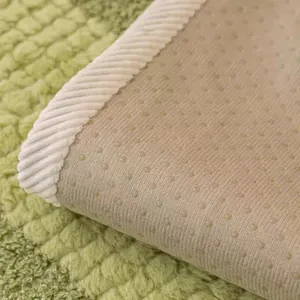 Green plush faux rabbit fur sofa cover with non-slip backing and thick soft texture