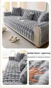 Detailed view of light grey bubble fleece sofa cover with thick plush texture and soft trim