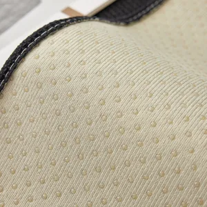Coussin canapé crème gaufré avec picots antidérapants et bordures cousues robustes