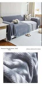 Macro shot of dark gray chenille sofa cover with waffle weave texture and modern finish